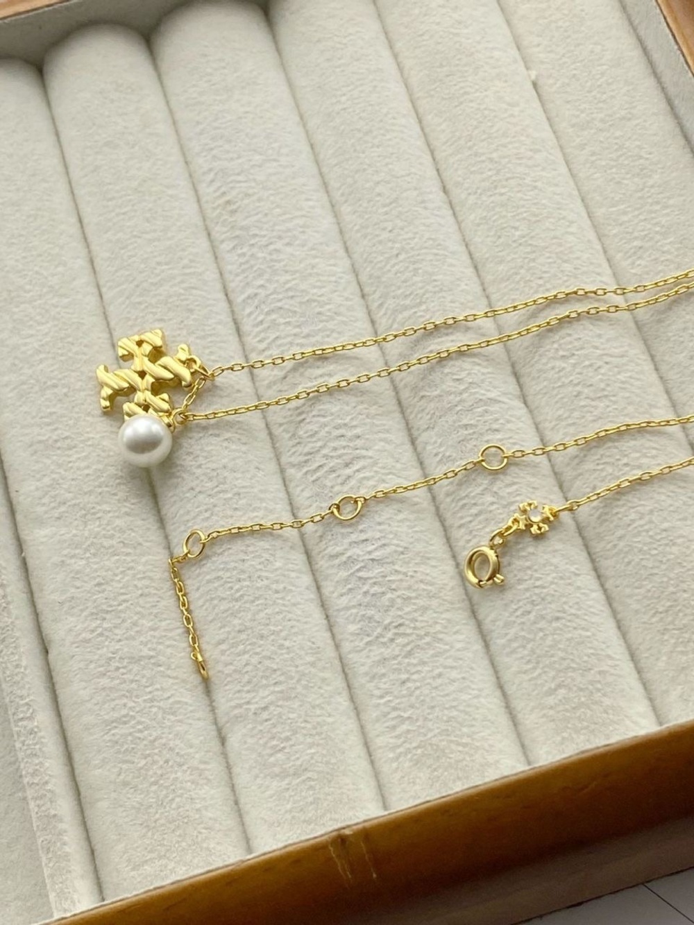 Tory Burch Gold Logo Pendant Necklace with White Pearl Accent